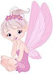 Very cute fairy sitting and listens attentively