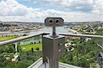 Binoculars on viewing platform overlooking Bosphorus river and Istanbul Turkey from famous Pierre Loti Cafe