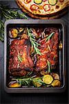 BBQ spare ribs with herbs and vegetables - top view