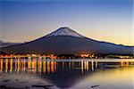 Mt. Fuji, Japan viewed from Lake Kawaguchi at dusk.