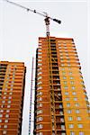 High rise construction. Brick houses under construction