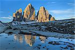 Tre cime di Lavaredo reflected from a lake, Dolomite Alps, Italy