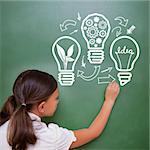 Idea and innovation graphic against cute pupil writing on chalkboard