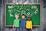 Cute kids smiling against blackboard with copy space on wooden board