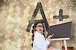 Cute pupil with chalkboard against wooden surface with planks