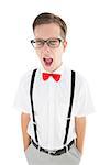 Nerdy hipster yawning in suspenders and bow tie on white background