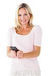 Happy blonde sending a text on white background