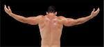 Rear view of a shirtless muscular man with arms raised over black background