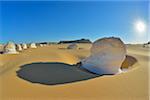 Sun over Rock Formations in White Desert, Libyan Desert, Sahara Desert, New Valley Governorate, Egypt