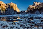 Winter landscape with iced river and El Capitan mountain behind, Yosemite National Park, California, USA