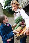 Grandmother and girl with vegetables