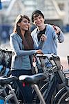 Young couple with bicycles