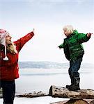 Mother helping son balancing