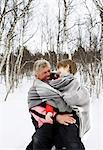 Grandfather and Grandson in snow