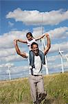 Father and daughter on a windfarm