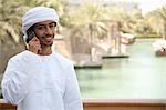 Middle Eastern man using mobile phone