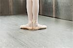 Feet of ballerina in first position