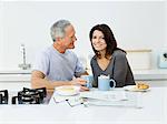 Mature couple having breakfast