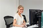 Businesswoman using computer