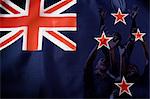 New Zealand flag and rugby players