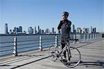 Man doing up bike helmet strap