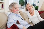 Senior couple relaxing on sofa