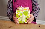 Little girl holding a gift