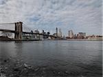 View of Brooklyn Bridge and Manhattan from East River in winter, New York City, New York, USA