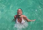 Woman swimming in tropical sea