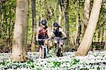 Couple mountain biking together