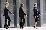 Businesswomen marching in time