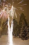 Fireworks in snowy field