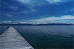 Wooden dock in still lake