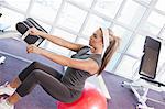 Girl exercising in gym