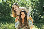 Teenage girls playing outdoors