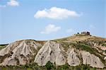 Stone ruins on rocky hillside