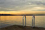 Wooden dock on still lake