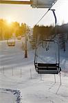 Ski chairlift over snowy landscape