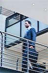 Blurred view of businessman on balcony