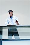 Businessman working on balcony