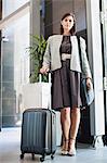 Businesswoman with luggage