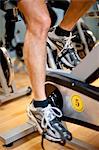 Man using spin machine in gym