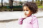 Close up of girl standing in park