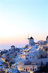 Oia town and windmill at dusk, Santorini, Cyclades Islands, Greece