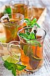 Traditional turkish tea with fresh mint and lime. Selective focus.