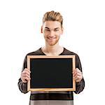 Good looking young man holding a chalkboard