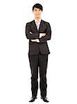 young businessman standing isolated on white background