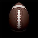 A realistic illustration of an American football on a black shadowed background. Vector EPS 10 available. EPS file contains transparencies. Room for copy.