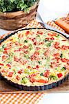 Quiche with salmon and vegetables for lunch