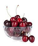 Ripe cherries in a glass bowl. Isolated on white background